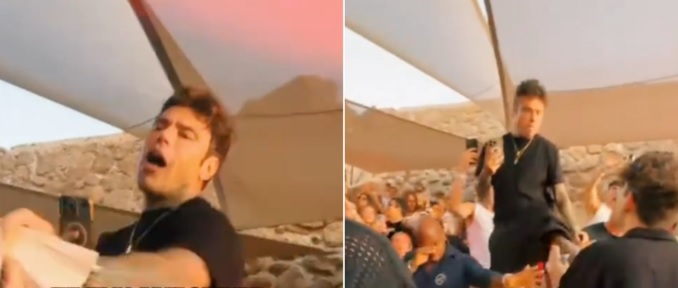 Fedez tira un calcio ad un ragazzo che lo riprende – Scoppia la polemica: “Prepotente perché ha la sicurezza”